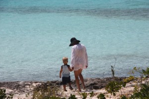Ethan and Gaye walking to the water, always on the lookout for shells, sand dollars and colorful pieces of beach glass.