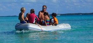 Richard and the kids taking dinghy rides and towing a little wake board