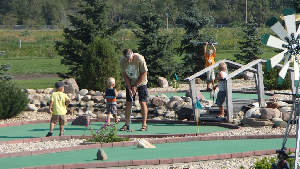 Grandpa mini golfing with all the little boys.  I think Matthew got a whole in one in the background!