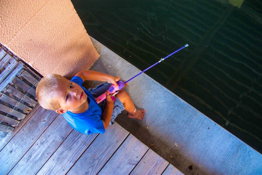 Mooky loved to fish off the dock... he didn't know all he had was weight on the end of the line.