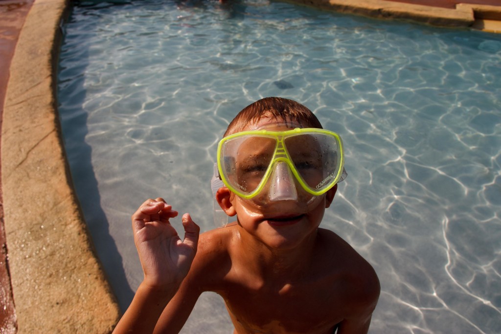 Mattie and his snorkel mask. He doesn't enter the pool without it!