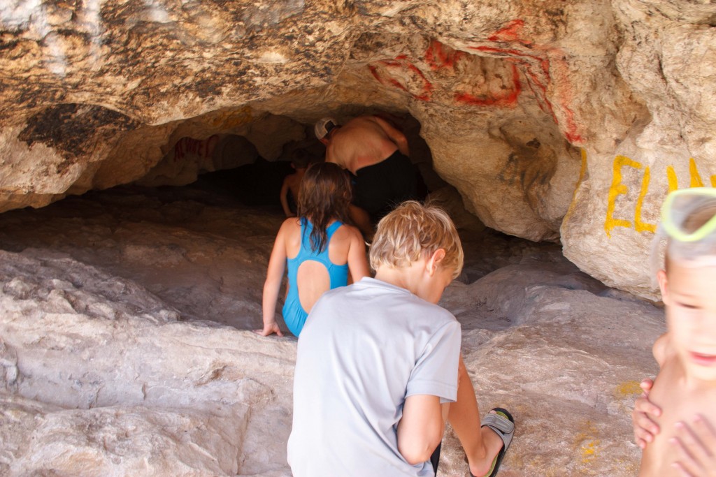 Exploring a cave at Wadi Bani Khalid.