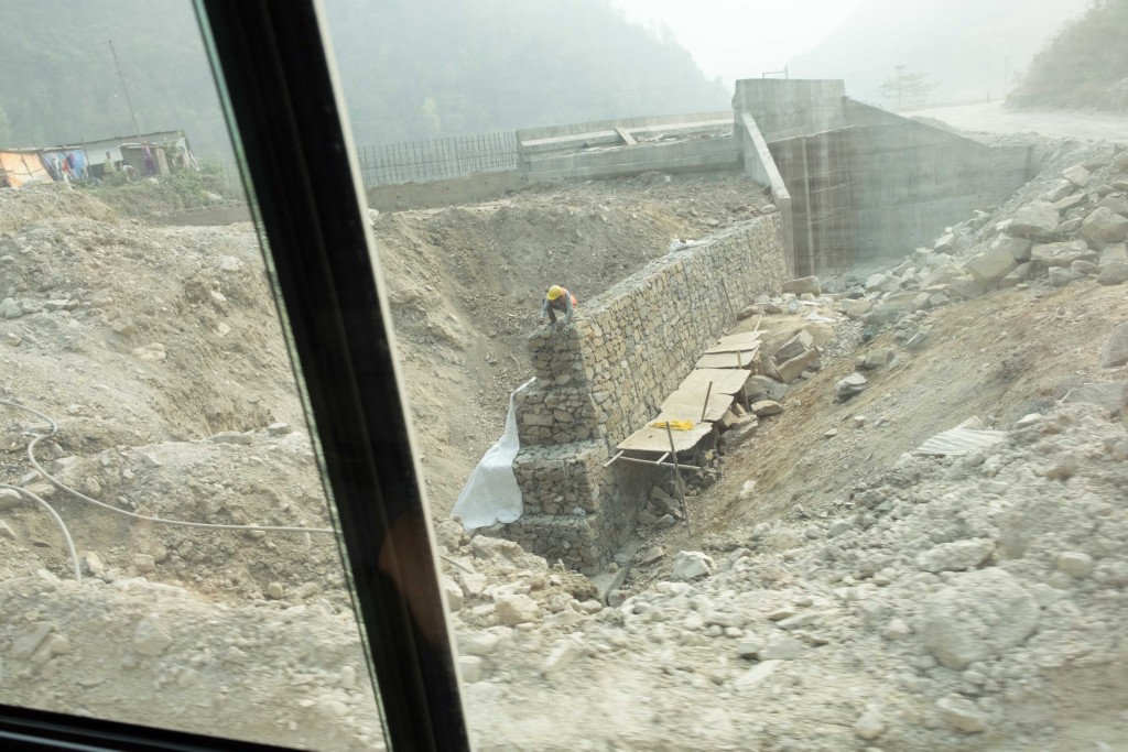Construction in Nepal. All build by hand. The dust, safety and living conditions for workers is extremely challenging. We were amazed at what they do with so little!