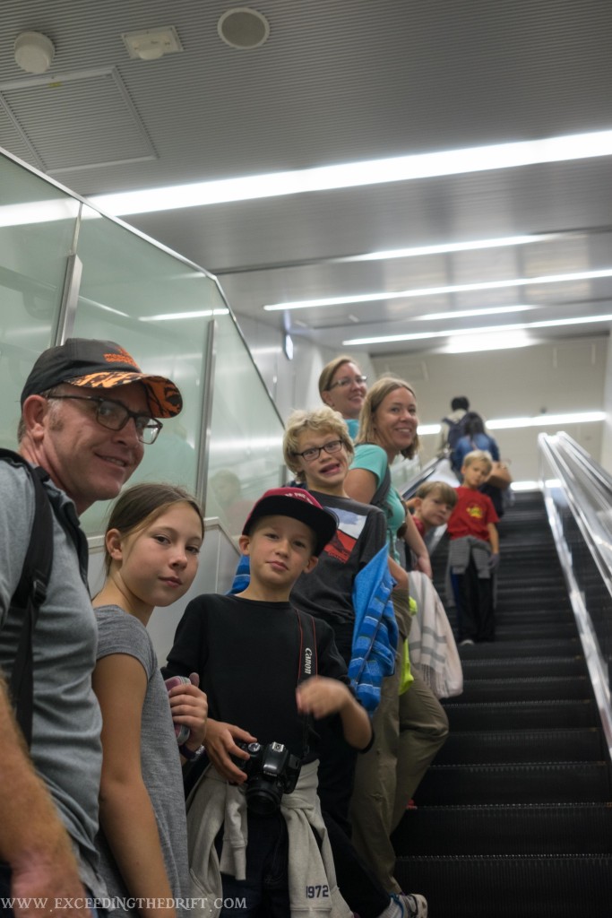 I love talking pictures on escalators. They set everyone for a pose but it's moving so it's still a little spontaneous. 
